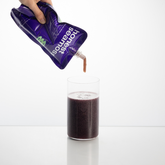 Honest Sea Moss gel being poured into a cup
